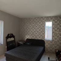 Pilis zártkertjében két  szoba ,amerikai konyhás nappalis ház vált eladóvá